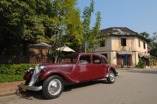 Vintage cars in old-fashioned main street, Luang Prabang Loas.