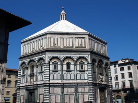 The Baptistery of San Giovanni in Florence Italy. The florence octagonal baptistery of st john is one of the city's oldest buildings built in romanesque style around 1059