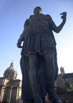 Julius Caesar Statue in the Forum Rome Italy With Churches in Background