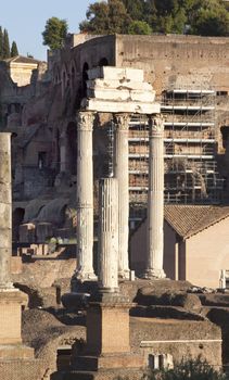 Temple of Castor and Pollux, also called Temple of Dioscuri, built in 484BC to commensurate the victory of Aulus Postumius over the Latins in the battle of Lake Regillus.  The three Corinthian columns and part of the cornice date to the era of Tiberius or 2nd century AD.