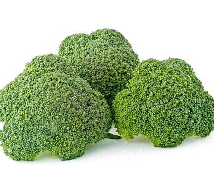 Fresh, Raw, Green Broccoli Pieces, Cut and Ready to Eat