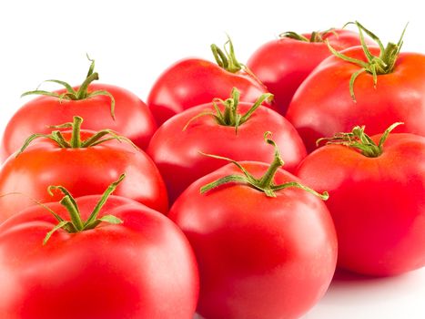 A Bunch of Red Ripe Tomatoes Isolated on White