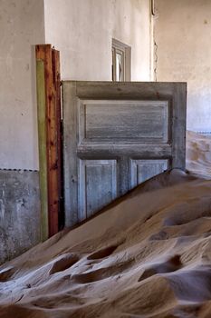 a dune in a house at kolmanskop ghost town near luderitz namibia 