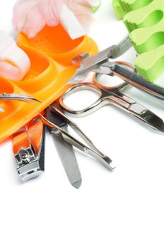 Manicure and Pedicure Set with Various Tools and  Accessories closeup on white background