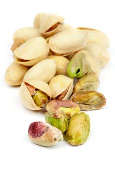 Heap of Perfect Pistachio closeup on White background