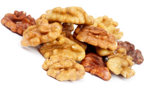 Heap of Dried Walnuts isolated on white background