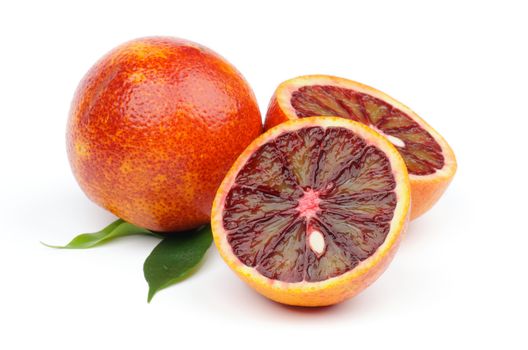 Ripe Blood Oranges Full Body and Two Halves isolated on white background