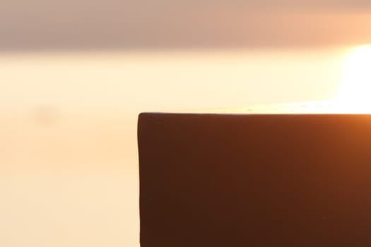 Colour, motion and pattern of a lake at sunset