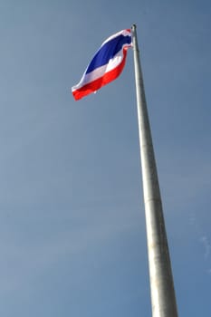 Flag of Thailand Against a Blue Sky