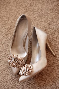 Wedding shoes with a bow and on a high heel
