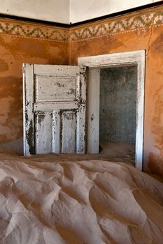 dune in a house at kolmanskop ghost town near luderitz namibia 