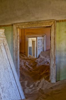 house overtaken by dune sand at kolmanskop ghost town near luderitz namibia africa