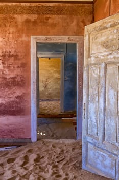 house overtaken by dune sand at kolmanskop ghost town near luderitz 