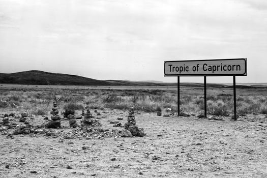 tropic of capricorn sign in namibia africa beside a road