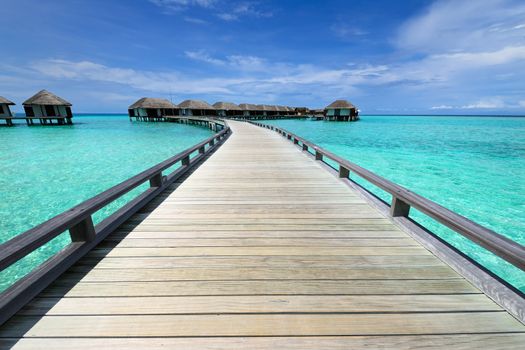 Beautiful beach with water bungalows at Maldives