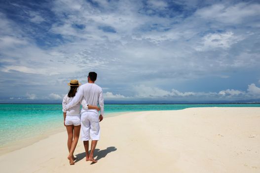 Couple on a tropical beach at Maldives