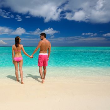 Couple on a tropical beach at Maldives