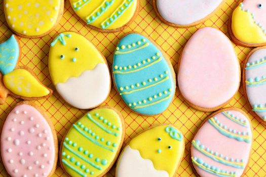 Easter homemade gingerbread cookie over tablecloth