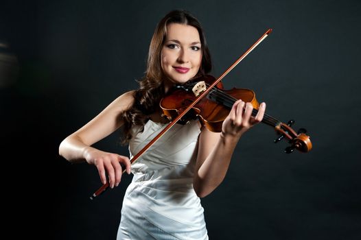 violinist on black background