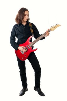 Young guitarist with red guitar on white background