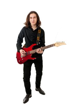 Young guitarist with red guitar on white background