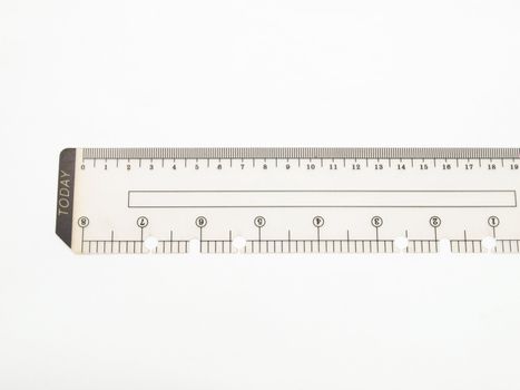 Closeup of used plastic ruler isolated on white background