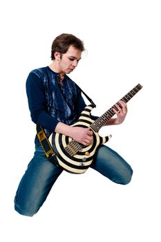 Young guitarist with electric guitar on white background