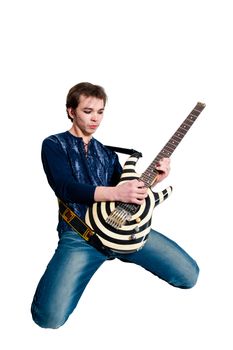 Young guitarist with electric guitar on white background