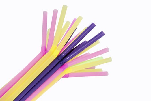 a bunch of drinking straws different color