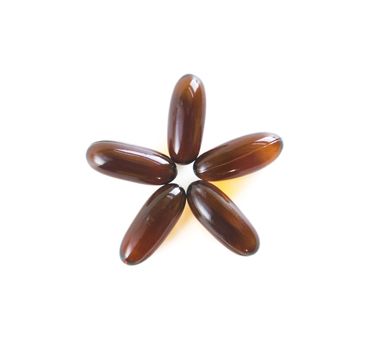 Five Flax Seed Oil Capsules in a Star Pattern Isolated Against White.