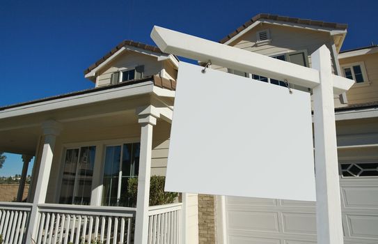 Blank Real Estate Sign in Front of Beautiful New Home