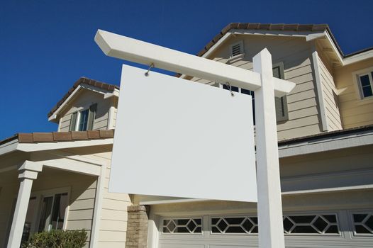 Blank Real Estate Sign in Front of Beautiful New Home