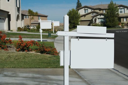 Blank Real Estate Sign in Front of Beautiful New Home