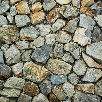 Pattern of rocks placed together on the ground.