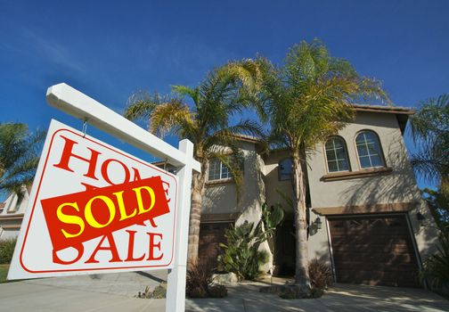 Sold Home For Sale Sign in Front of New House