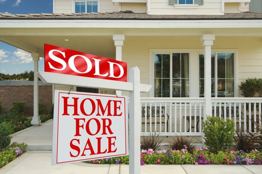 Sold Home For Sale Sign in Front of New House