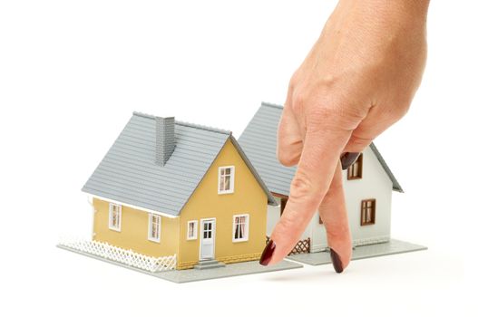 Female hand gesturing house shopping isolated on a white  background.