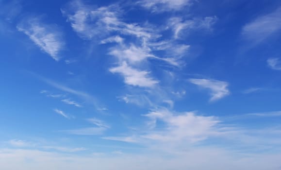 Blue sky with fleecy clouds