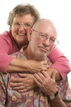 Affectionate, Happy Senior Couple poses for portrait. 