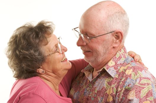 Happy Senior Couple romantically dancing.