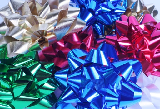 Shiny colorful satin bows. Holiday, celebration, party theme.