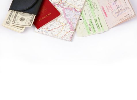 Travel frame on white with passport, map, fly tickets and money