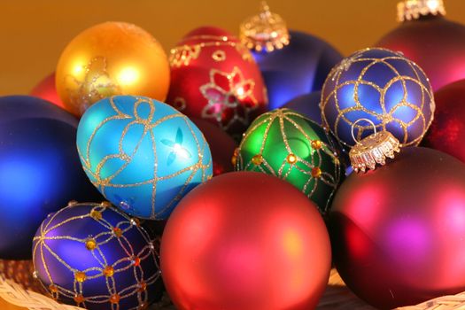 Large assortment of beautiful colorful Christmas ornaments.