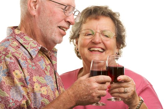 Happy Senior Couple toasting with Winee glasses.