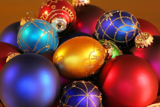 Large assortment of beautiful colorful Christmas ornaments.
