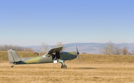 an old plane is preparing to fly