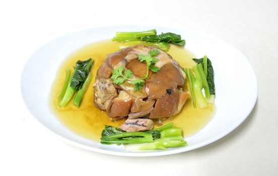 stewed pork knuckle with kale , chinese cuisine