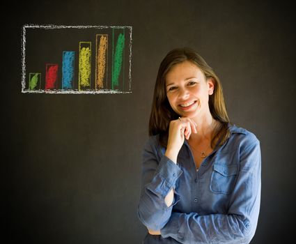 Confident business woman or teacher with arms crossed against a blackboard background