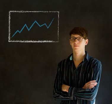 Confident business man or teacher with arms crossed against a blackboard background