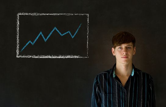 Confident business man or teacher against a blackboard background